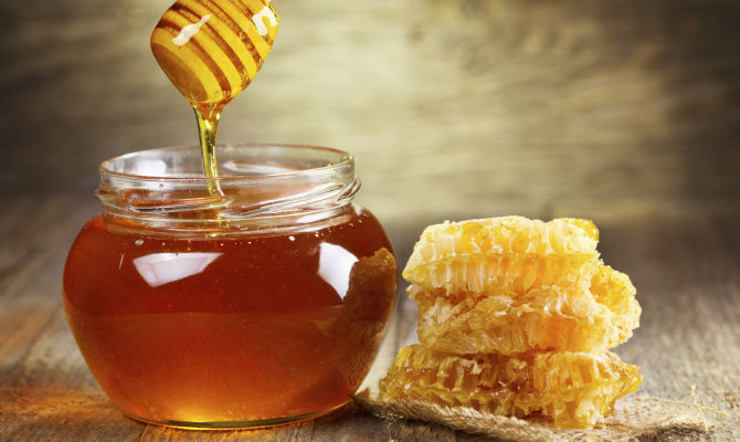 vasetto di miele, prodotto naturale apicoltura<br>