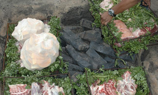 preparazione carne e verdure in buca Nuova Zelanda