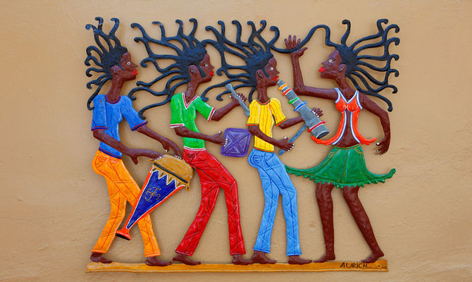 Suonatori e danzatori in un dipinto dell'artigianato dominicano